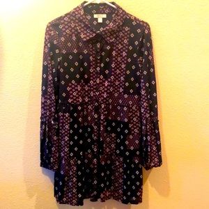 Pretty tunic. light to wear beautiful color.